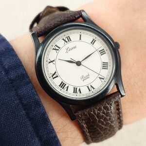 Ricoh Leone Quartz 172005 Black Case Roman Dial Vintage Dress Watch 31mm Unisex